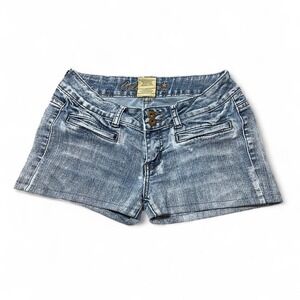 Low rise blue denim shorts with button fly and pockets